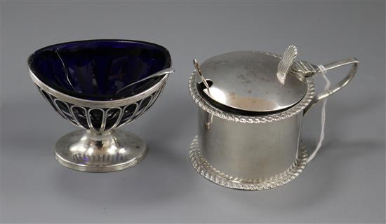 A George V silver mustard pot and an Edwardian silver salt.